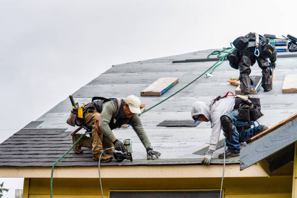 Professional Gutter Installation technician working in Keene Valley, NY